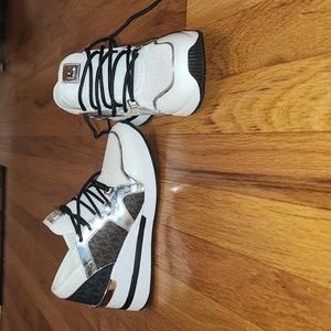 Brand new Michael Kors wedge sneakers